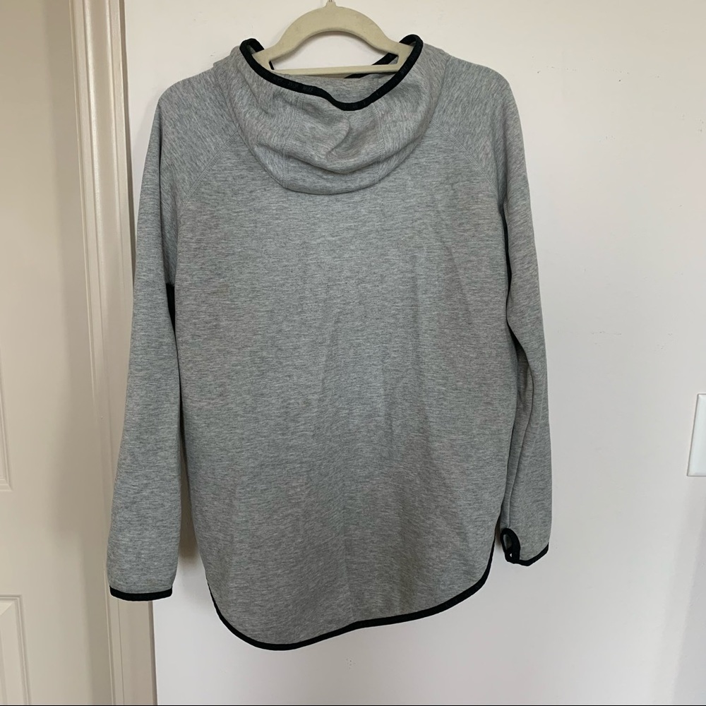 NIKE ASYMMETRICAL HIGH LOW JACKET - Picture 6 of 7